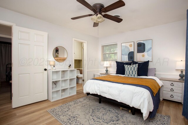 6010 Calumet Rd, Amarillo, TX 79106 - bedroom with light wood-type flooring, ensuite bath, and a ceiling fan