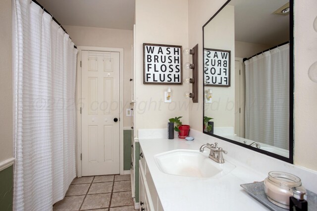 6010 Calumet Rd, Amarillo, TX 79106 - full bath with vanity and tile patterned floors