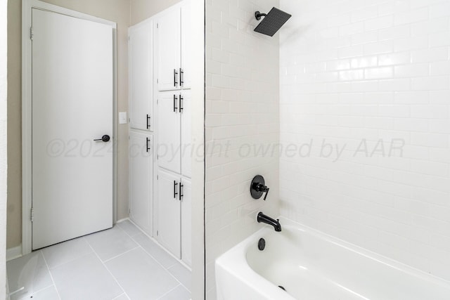 bathroom with tile patterned flooring and tiled shower / bath combo