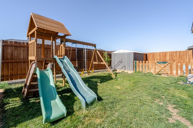 1706 Morningside Ave, Amarillo, TX 79118 - view of playground with a fenced backyard and a shed