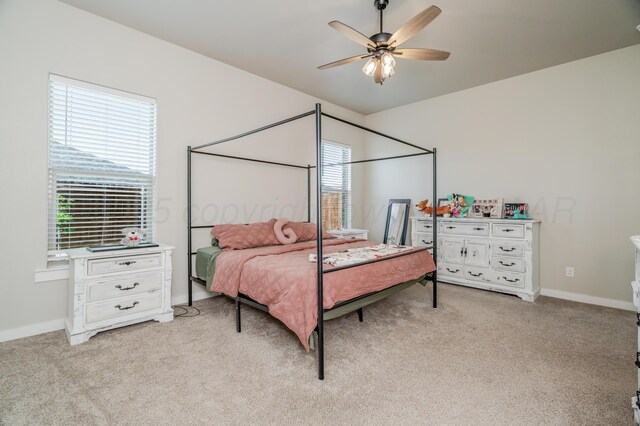 1706 Morningside Ave, Amarillo, TX 79118 - bedroom featuring light carpet and ceiling fan