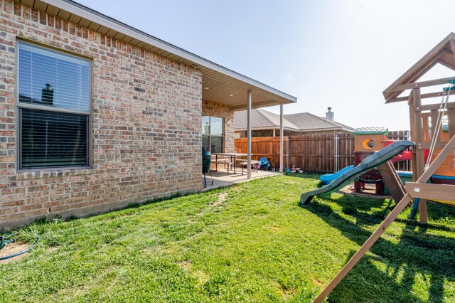 1706 Morningside Ave, Amarillo, TX 79118 - view of yard featuring a patio area and a playground