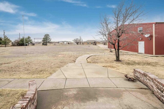 1513 S Girl Scout Rd, Amarillo, TX 79124 - view of yard featuring an outbuilding
