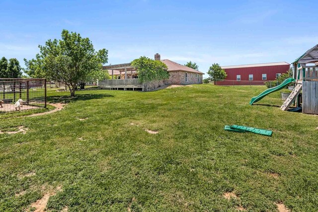 1513 S Girl Scout Rd, Amarillo, TX 79124 - view of yard with a playground