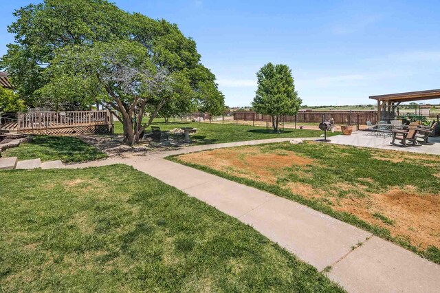 1513 S Girl Scout Rd, Amarillo, TX 79124 - view of yard with a patio area and a deck