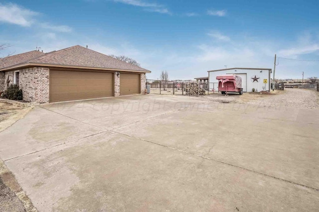 1513 S Girl Scout Rd, Amarillo, TX 79124 - garage with fence