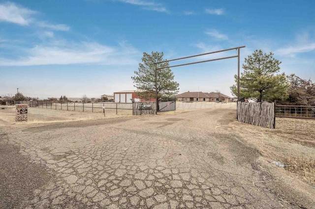 1513 S Girl Scout Rd, Amarillo, TX 79124 - view of street with a gated entry