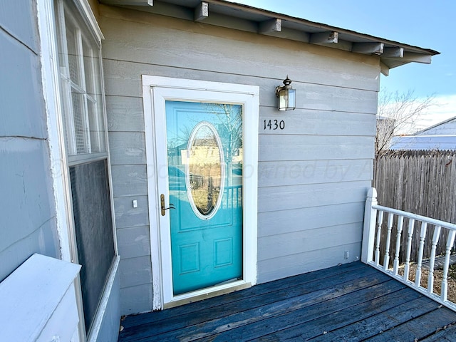 property entrance featuring fence