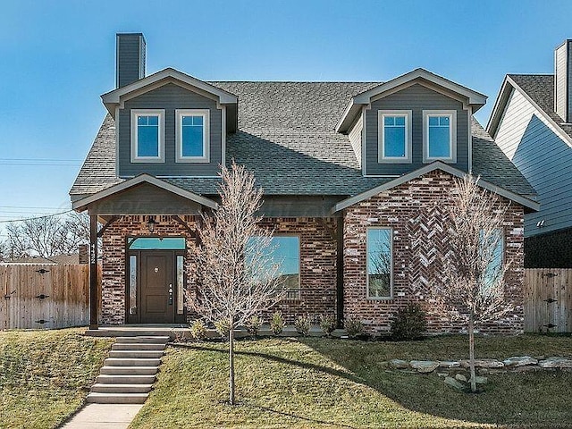 4422 Oliver Pl, Amarillo, TX 79106 - craftsman inspired home featuring a shingled roof, brick siding, and a chimney