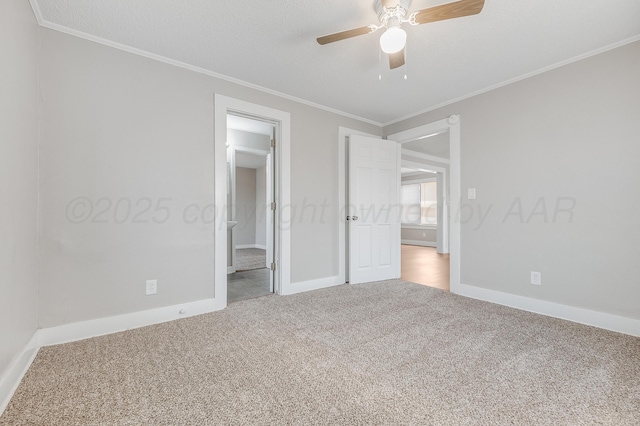 4818 Brown Ave, Amarillo, TX 79108 - unfurnished bedroom featuring carpet flooring, ornamental molding, baseboards, and a ceiling fan