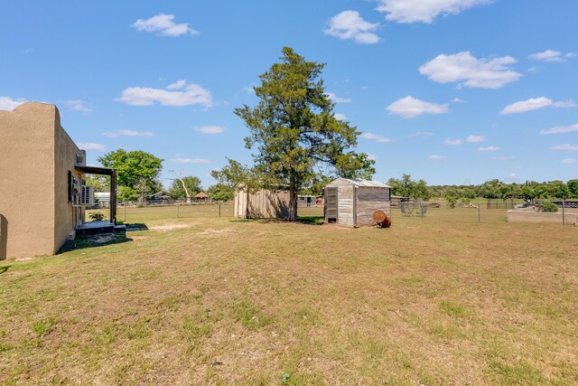 4818 Brown Ave, Amarillo, TX 79108 - view of yard featuring a shed and an outbuilding