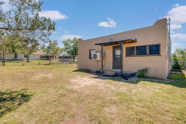 4818 Brown Ave, Amarillo, TX 79108 - back of property featuring stucco siding and ac unit
