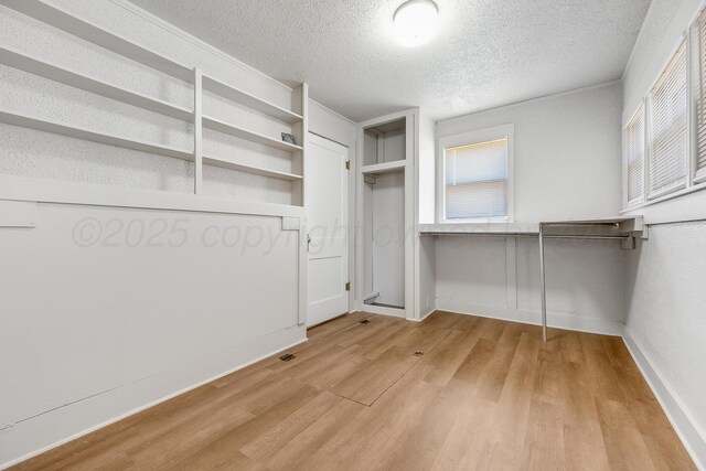 4818 Brown Ave, Amarillo, TX 79108 - spacious closet featuring light wood-type flooring