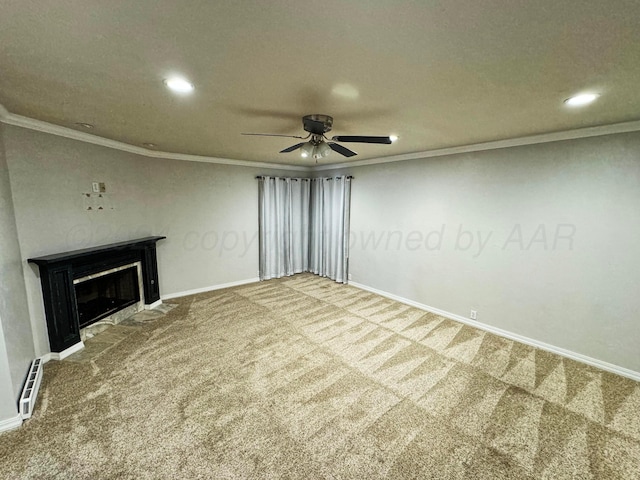 unfurnished living room with carpet, ornamental molding, a textured ceiling, a baseboard heating unit, and ceiling fan