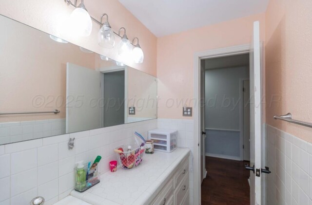 6102 Calumet Rd, Amarillo, TX 79106 - bathroom featuring wood finished floors and vanity