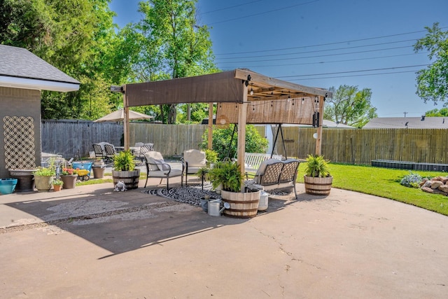 2211 N Aspen Dr, Pampa, TX 79065 - fenced backyard with a patio area