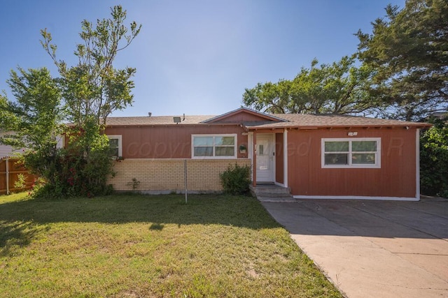 937 Dahlia St, Amarillo, TX 79107 - ranch-style home with brick siding and concrete driveway