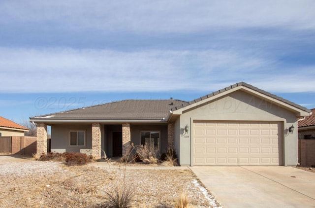 ranch-style house with stucco siding, fence, a garage, driveway, and a tiled roof