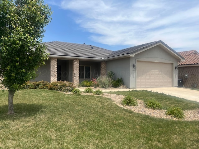 1104 Chardonnay Blvd, Amarillo, TX 79124 - ranch-style home featuring a garage, a tile roof, a front yard, and driveway
