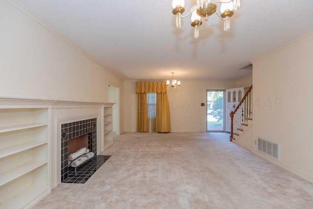 2807 S Harrison St, Amarillo, TX 79109 - unfurnished living room with a chandelier, crown molding, a tile fireplace, stairs, and carpet