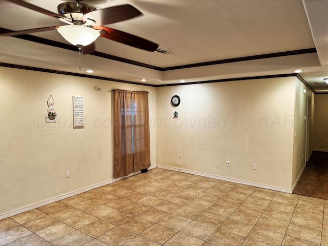 empty room with ceiling fan and ornamental molding