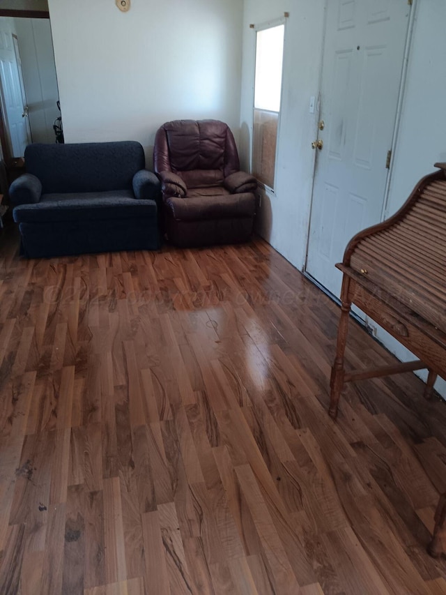 living room featuring dark hardwood / wood-style floors