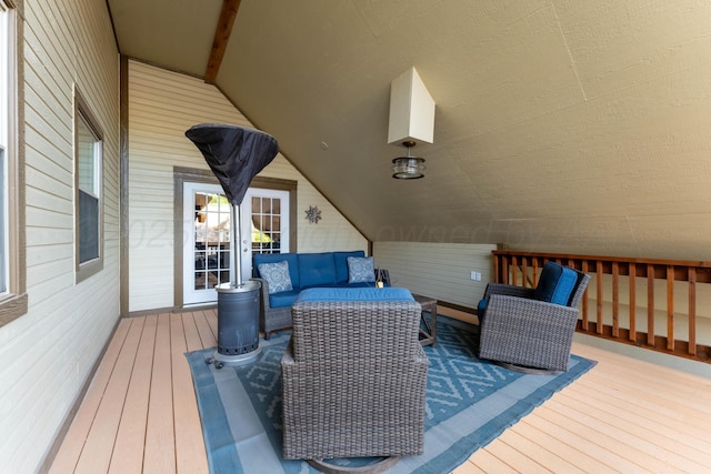 deck with an outdoor hangout area