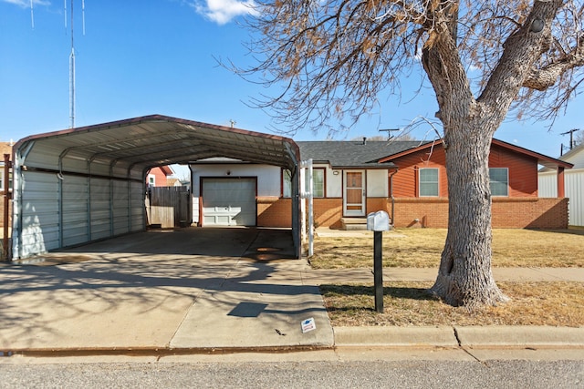 ranch-style home with a carport and a garage