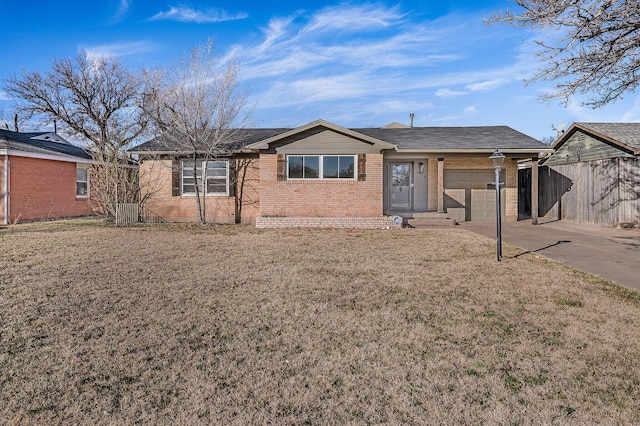 ranch-style home with a garage and a front lawn