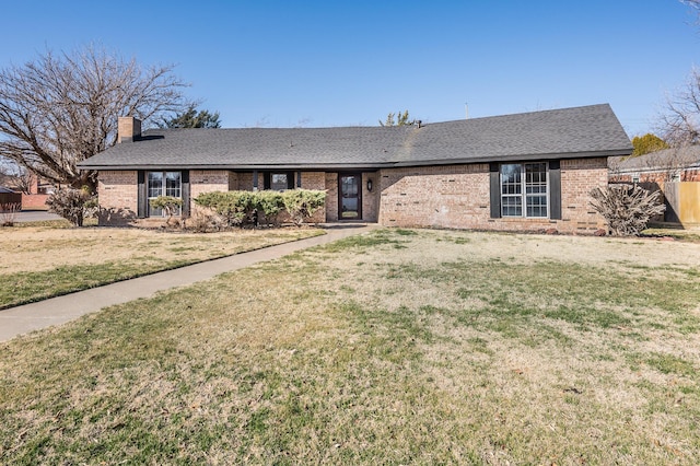 single story home with a front yard