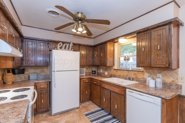5025 S Fannin St, Amarillo, TX 79110 - kitchen featuring white appliances, ceiling fan, decorative backsplash, light tile patterned floors, and premium range hood