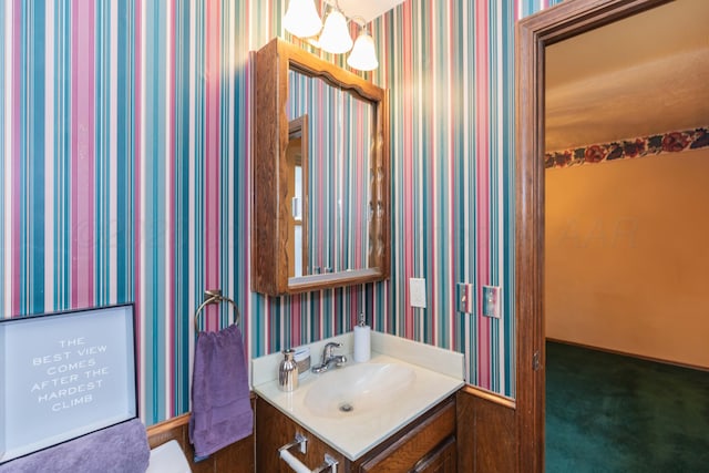 5025 S Fannin St, Amarillo, TX 79110 - bathroom with wallpapered walls and vanity