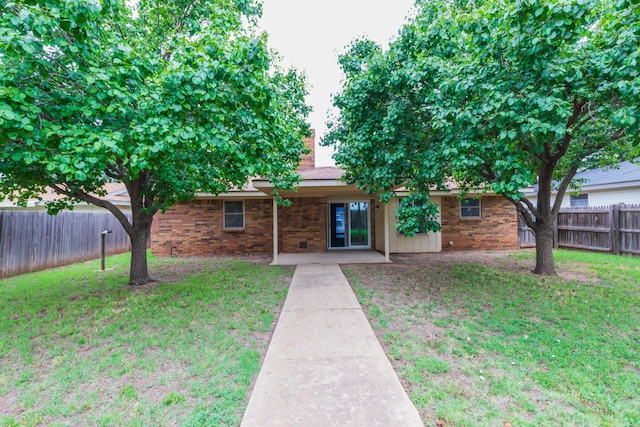5025 S Fannin St, Amarillo, TX 79110 - view of front of property featuring a fenced backyard and brick siding