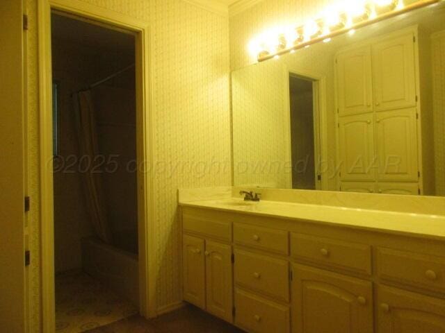 7503 Baughman Dr, Amarillo, TX 79121 - bathroom featuring double vanity and shower / tub combo