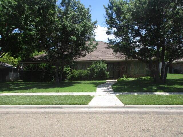 7503 Baughman Dr, Amarillo, TX 79121 - view of front facade with a front yard
