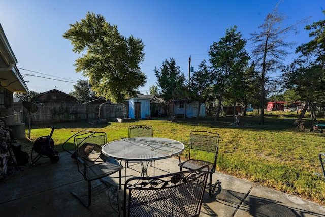 view of patio / terrace featuring a shed