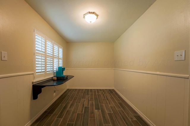 laundry room with dark hardwood / wood-style floors