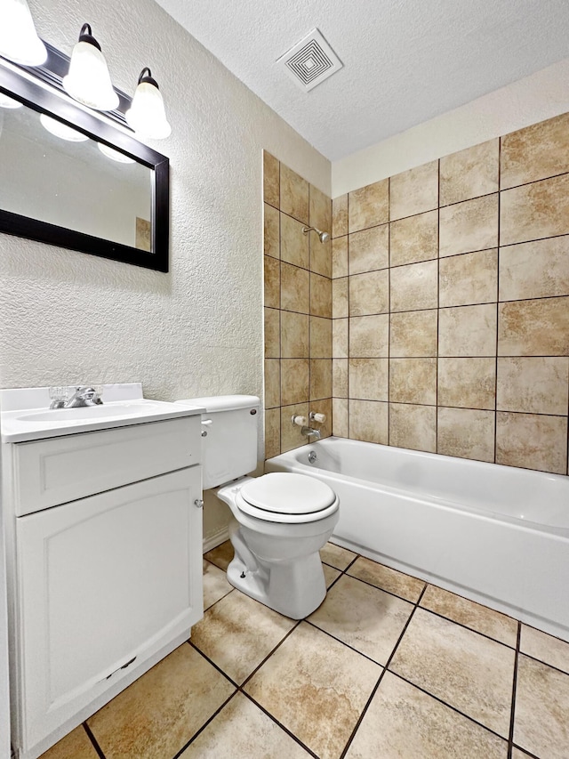 bathroom featuring visible vents, vanity, a textured wall, a textured ceiling, and shower / washtub combination