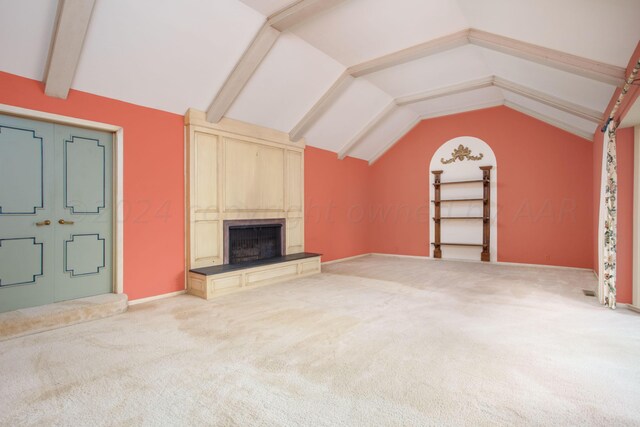 4321 Emil Ave, Amarillo, TX 79106 - unfurnished living room with vaulted ceiling, light colored carpet, a fireplace, and baseboards