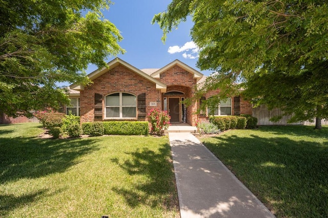 905 Red Deer Ln, White Deer, TX 79097 - view of front of home with brick siding and a front lawn