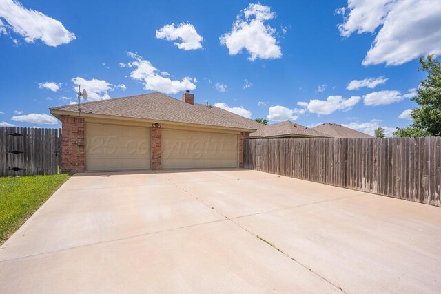 905 Red Deer Ln, White Deer, TX 79097 - view of home's exterior with brick siding and a chimney