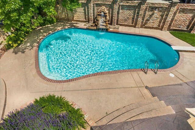 3511 Kensington Pl, Amarillo, TX 79121 - view of pool featuring a diving board