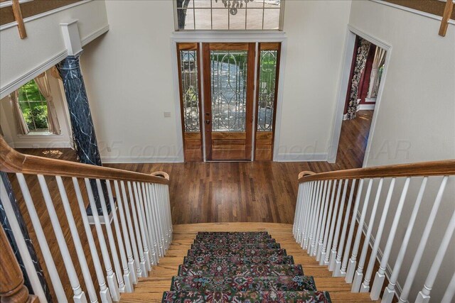 3511 Kensington Pl, Amarillo, TX 79121 - entrance foyer with wood finished floors and healthy amount of natural light