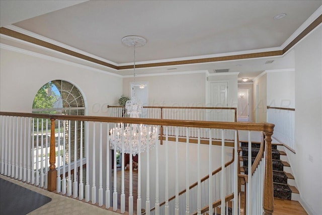 3511 Kensington Pl, Amarillo, TX 79121 - corridor featuring ornamental molding, a chandelier, and an upstairs landing