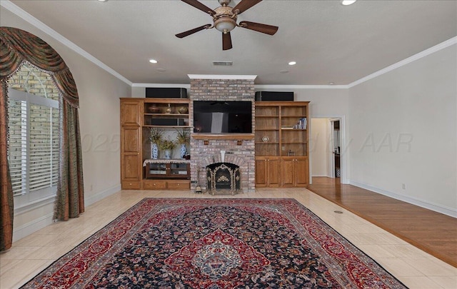 3511 Kensington Pl, Amarillo, TX 79121 - living area featuring a ceiling fan, a fireplace, baseboards, recessed lighting, and ornamental molding