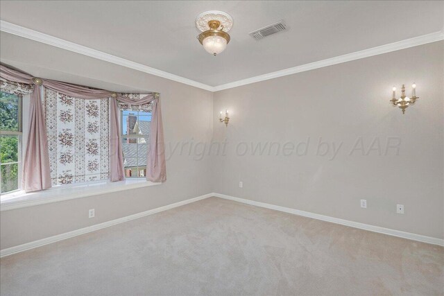 3511 Kensington Pl, Amarillo, TX 79121 - carpeted empty room featuring baseboards, crown molding, and a chandelier