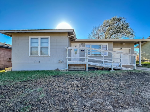 view of front of home with a deck