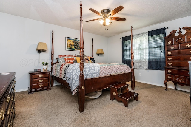 8615 Olympia Dr, Amarillo, TX 79110 - carpeted bedroom with baseboards and ceiling fan