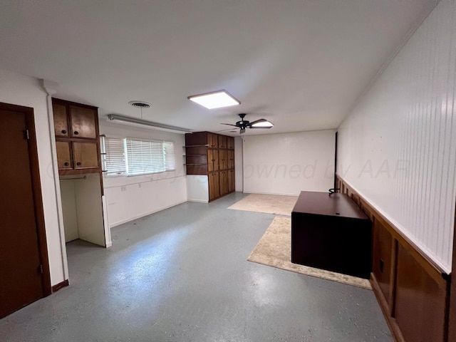 6201 Adirondack Trl, Amarillo, TX 79106 - unfurnished living room featuring finished concrete flooring and ceiling fan
