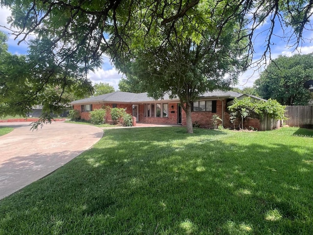 6201 Adirondack Trl, Amarillo, TX 79106 - ranch-style home featuring brick siding and concrete driveway